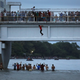 People are jumping into the river below to enter Mexico from Guatemala October 20, 2018.